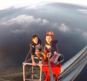 Κρατήστε την ανάσα σας: Δύο νεαροί ανέβηκαν στα 350 μέτρα ύψος για μια selfie χωρίς κανέναν εξοπλισμό προστασίας - Bίντεο