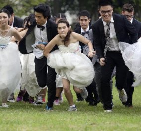 Βίντεο, φώτο: 250 νύφες και γαμπροί έτρεξαν μαραθώνιο για να κερδίσουν τα έξοδα του γάμου!  