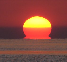 Ήλιος-ωμέγα: ένα συναρπαστικό φαινόμενο με το γράμμα της Ελληνικής αλφαβήτου στην βάση του δειλινού – φωτό
