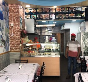 Ο Λιουσούφ από το Μπαγκλαντές άνοιξε εστιατοριάκι στην Αχαρνών με πόστερ από την Σαντορίνη αλλά & την πατρίδα του (φωτο)
