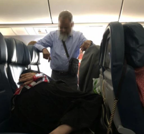 Ο άνδρας της ημέρας: Στάθηκε όρθιος για 6 ώρες στο αεροπλάνο για να κοιμηθεί η γυναίκα του & στα 2 καθίσματα (φωτό)