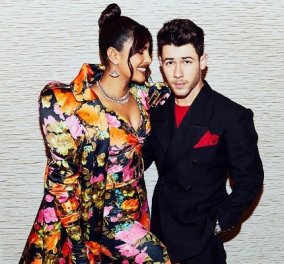 Gentleman ο Nick Jonas - φτιάχνει το floral outfit της γυναίκας του Priyanka Chopra στο κόκκινο χαλί (φωτό & βίντεο)