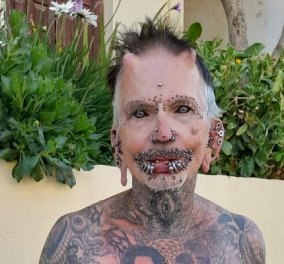 Στην Κρήτη ο άνθρωπος με τα ρεκόρ Γκίνες για ολική μεταμόρφωση: Κόρες ματιών μαύρες με μελάνι, 453 piercing, αμέτρητα τατουάζ (φωτό & βίντεο)