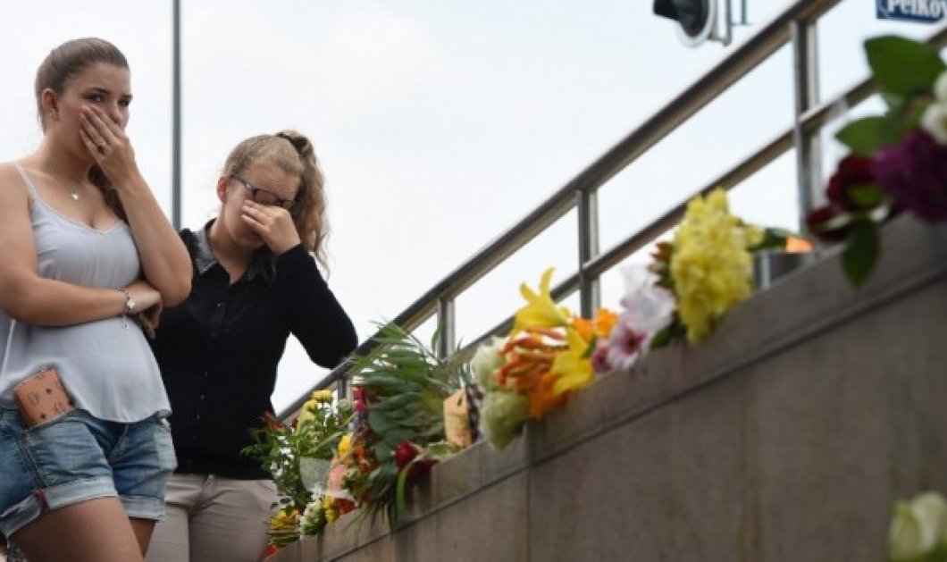 Η Γερμανία θρηνεί για τα 9 θύματα της επίθεσης στο εμπορικό κέντρο Olympia του Μονάχου Picture: AFP/ Christof Stache
