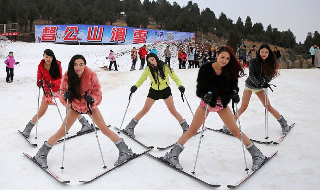 17/1/2015 - H μόδα της ''Ημέρας χωρίς παντελόνια'' πέρασε και από την Ασία - Κινεζούλες κάνουν σκι με τα εσώρουχα τους! Picture: Reuters