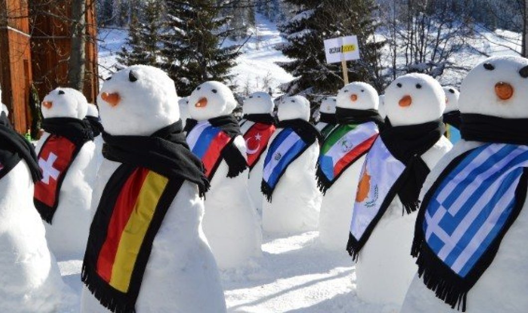 24/1/2015 - Ακτιβιστές έφτιαξαν 193 χιονάνθρωπους στο Ντάβος - Διαμαρτύρονται για την καταπολέμηση της φτώχειας, των ανισοτήτων & την κλιματική αλλαγή!