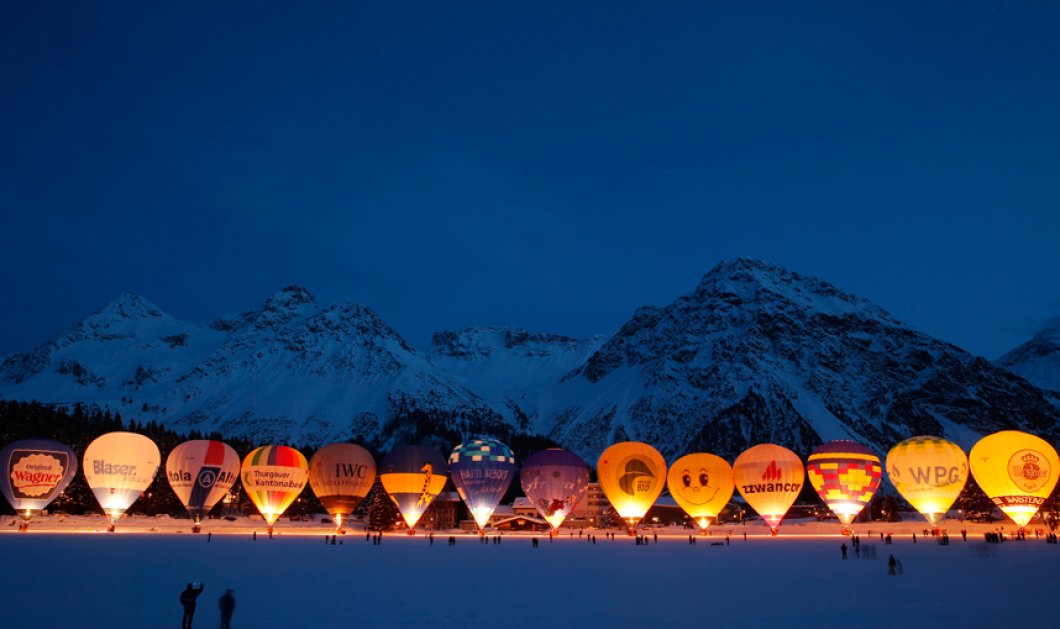 4/2/2015 - Εκπληκτικό στιγμιότυπο με τα αερόστατα παρατεταγμένα & έτοιμα να απογειωθούν στον ουρανό της Ελβετίας! Picture: REUTERS