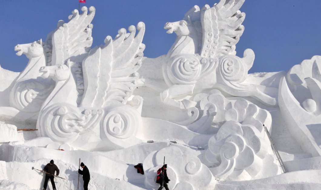 22/12/2014 - Εκπληκτική εικόνα από το ετήσιο Φεστιβάλ Πάγου και Χιονιού στην Κίνα - Φαντασμαγορικές δημιουργίες από μοναδικούς καλλιτέχνες!
