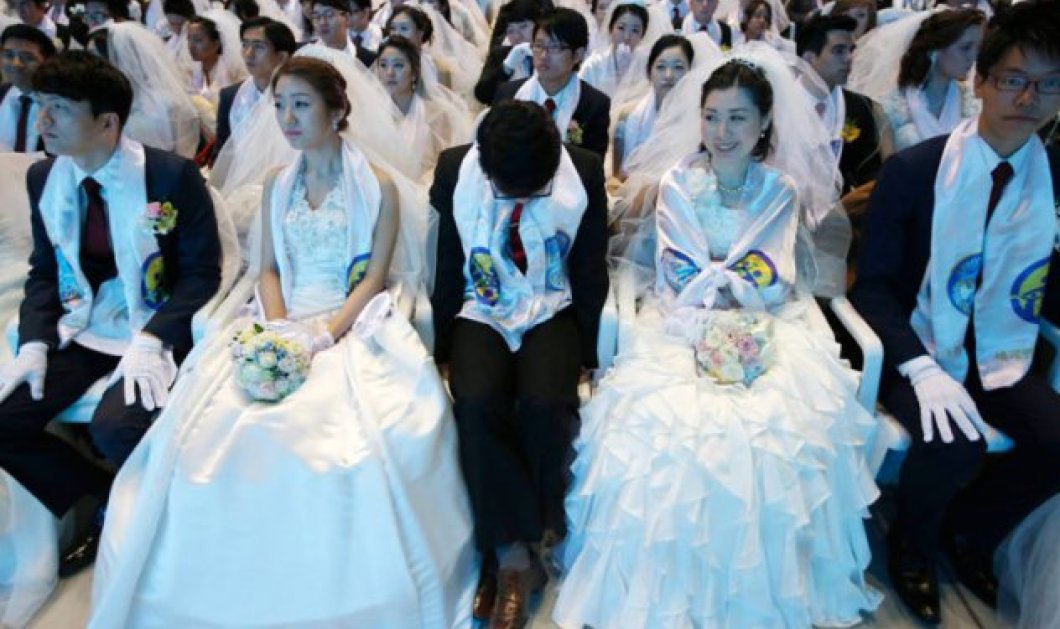 4/3/15: 3.800 νυφούλες & άλλοι τόσοι γαμπροί διάβηκαν ταυτόχρονα της... εκκλησιάς την πόρτα στη Ν. Κορέα! Μοναδικό! Φωτό: Kim Hong-Ji/Reuters