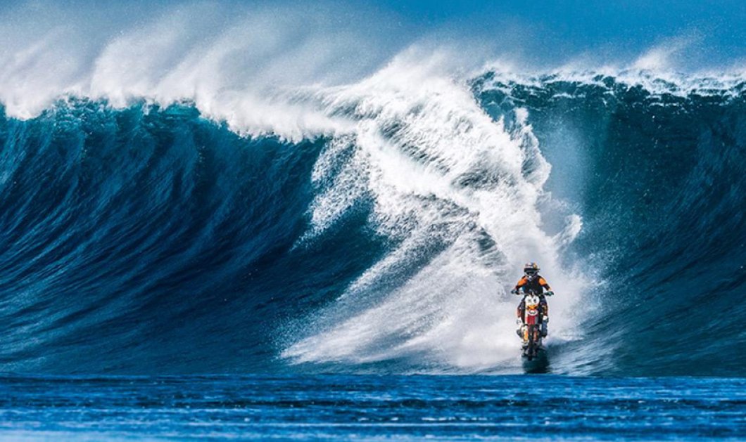 9/8/2015 - Μοτοσικλετιστής σερφάρει πάνω στα κύματα στην ακτή της Ταϊτής & συναρπάζει - Picture: DC Shoes