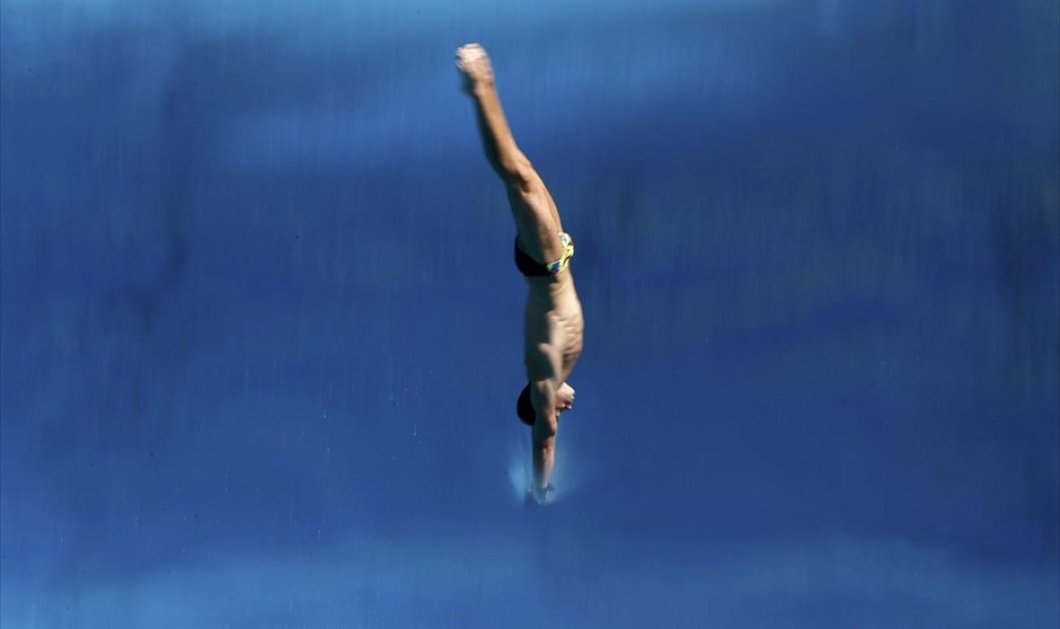 Κολυμβητής κάνει προπόνηση στο Ολυμπιακό καταδυτικό κέντρο στο Ρίο ντε Τζανέιρο - REUTERS / DAMIR SAGOLJ