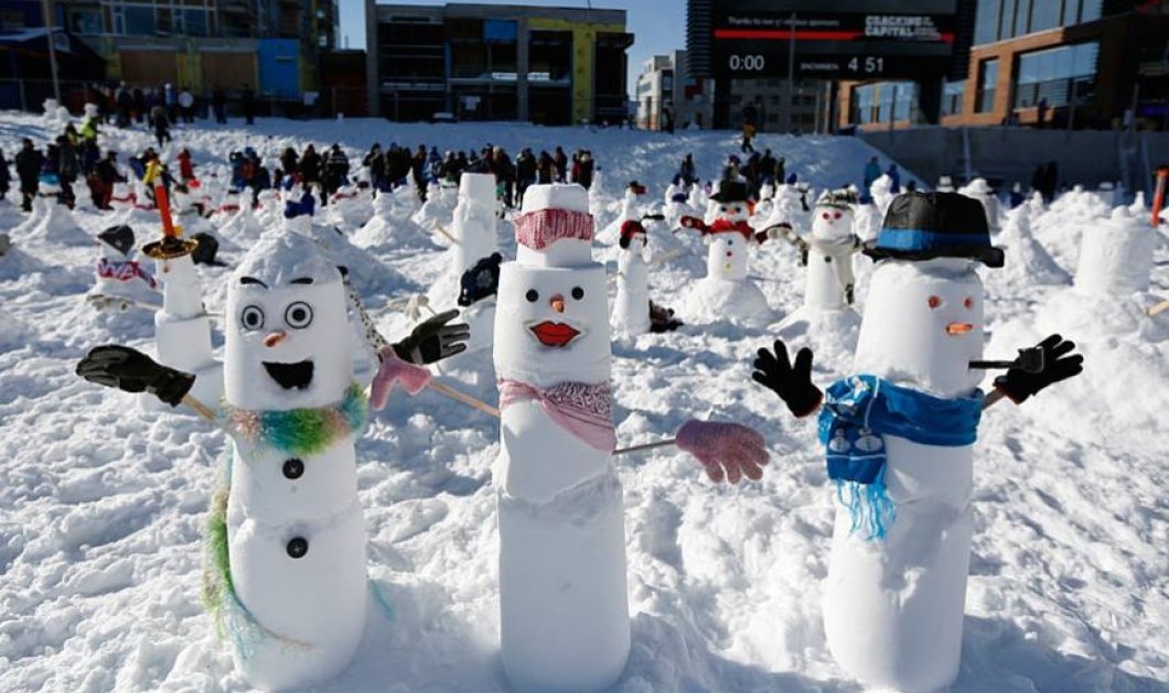 2/2/15 - 1299 χαμογελαστοί χιονάνθρωποι δημιουργήθηκαν στην Οτάβα για να σπάσουν το Ρεκόρ Γκίνες των 1279 που κρατούσε από το 2011 στη Salt Lake! 